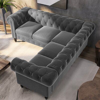 Grey L- Shaped velvet Chesterfield Sofa With Rolled Arms and tufted Upholstrey