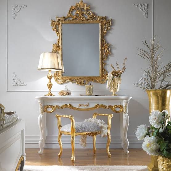 "White and gold leaf Italian dressing table with ornate carvings and elegant mirror, handcrafted from high-quality wood."